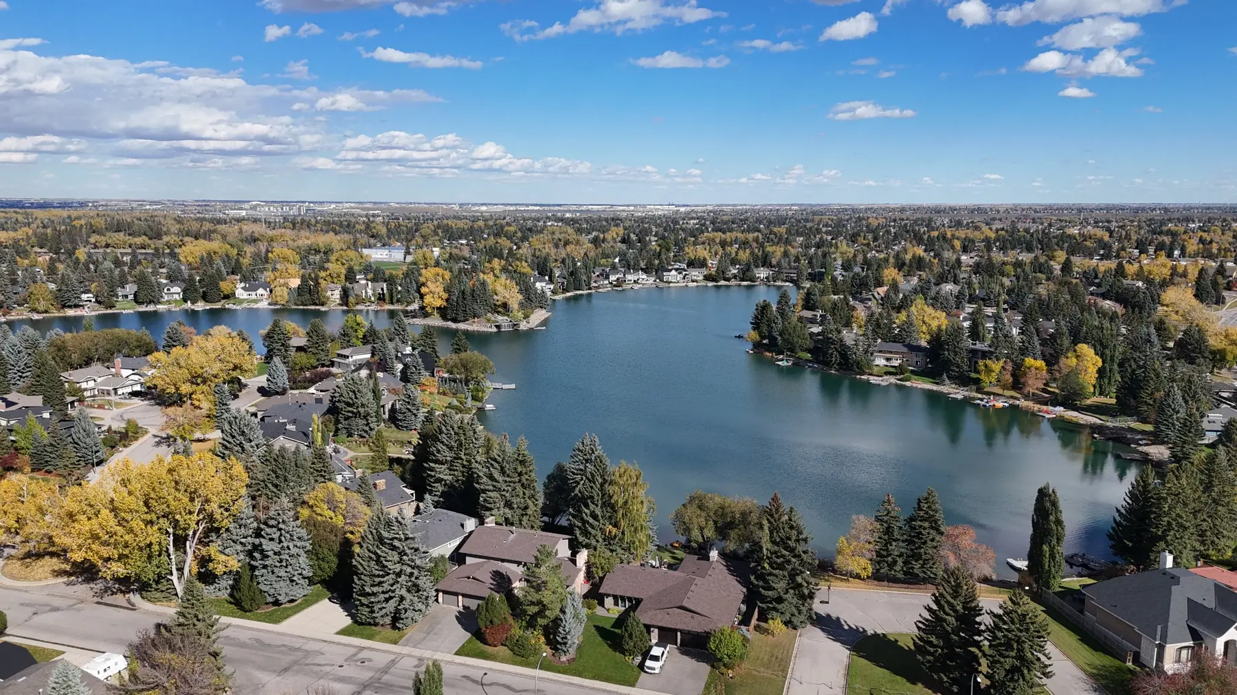 Drone photo of lake-front homes and docks on Lake Bonavista